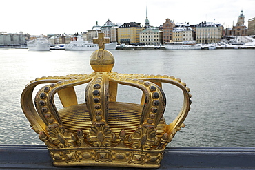 A gilded Swedish crown on the Skeppsholm Bridge (Skeppsholmsbron) in Stockholm, Sweden, Scandinavia, Europe