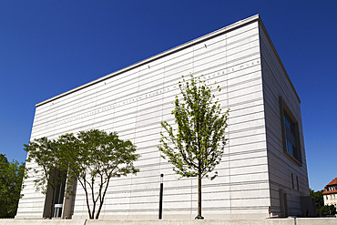 Trees by the facade of the Bauhaus Museum Weimar, designed by Heike Hanada, Weimar, Thuringia, Germany, Europe