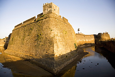 The walls and moat of the Fortress in the former Portuguese colony of Diu, Union Territory of Diu and Daman, India, Asia