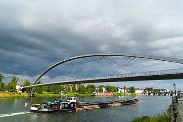 Barge under the Hoger Brug (Higher Bridge) on the River Maas, Maastricht, Limburg, The Netherlands, Europe