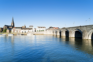 St. Maartenskerk (St. Martin Church) and St. Servatius Bridge on the River Maas, Maastricht, Limburg, The Netherlands, Europe