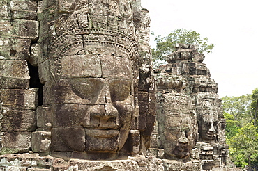 Huge faces carved in stone, Bayon Temple, UNESCO World Heritage Site, Angkor, Siem Reap, Cambodia, Indochina, Southeast Asia, Asia