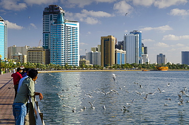 Modern skyline beside Khalid Lagoon, Sharjah, United Arab Emirates, Middle East