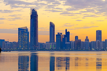 City skyline at dawn, Abu Dhabi, United Arab Emirates, Middle East