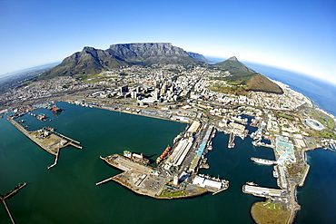 Aerial view of Cape Town showing Table Mountain, with Devil's Peak on the left, Lion's Head and Signal Hill on right, and the Waterfront and Table Bay Harbour in foreround, Cape Town, South Africa, Africa