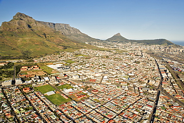 Aerial view of Woodstock and Salt River suburbs with Albert and Voortrekker roads visible on the right. with Devil's Peak and Table Mountain on left, Cape Town, South Africa, Africa