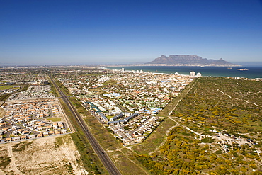 Aerial view down the beach and over the suburbs of West Beach, Blouberg, Sunningdale and Table View, Cape Town, South Africa, Africa