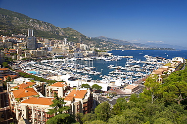 View across Port Hercule and the city and Principality of Monaco, Cote d'Azur, French Riviera, Mediterranean, Europe