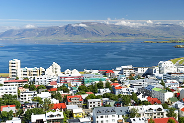 View over the capital including Faxa Bay and Snaefellsnes peninsula from the top of Hallgrimur's Church, Reykjavik, Iceland, Polar Regions