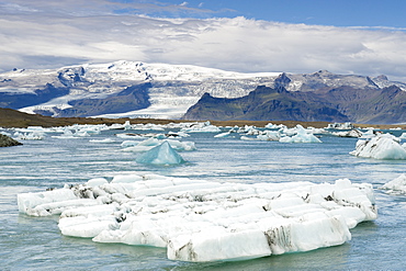 Icebergs floating in the Jokullsarlon lake at the foot of the massive Vatnajokull glacier, in the southeast, Iceland, Polar Regions