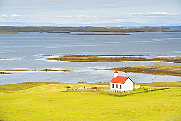 Flatey church and the coastal landscape of Breidafjordur fjord in the west, Iceland, Polar Regions