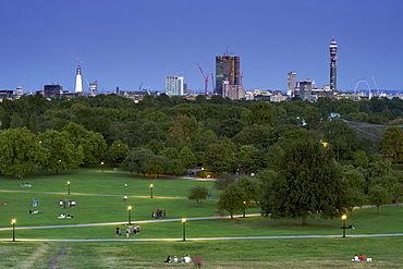 A dusk view of the London skyline from Primrose Hill showing the park, the BT tower and the London Eye, London, England, United Kingdom, Europe