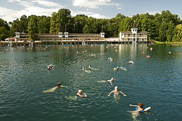 People swimming in the rejuvenating waters of Lake Heviz, Hungary, Europe