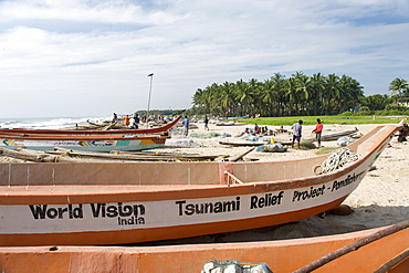 Fishermen and boats on Kailash Beach near Pondicherry in India