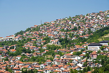 View of houses on the hills surrounding Sarajevo, capital of Bosnia and Herzegovina, Europe