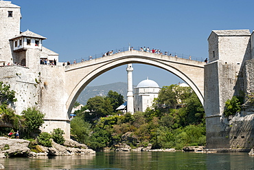 The Stari Most (Old Bridge) spanning the Neretva River in the Old City, UNESCO World Heritage Site, Mostar, Bosnia and Herzegovina, Europe