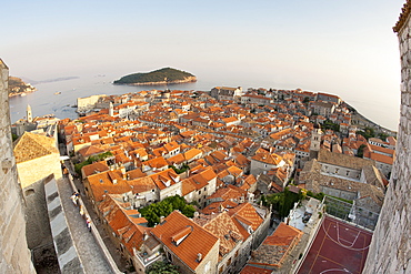 View from the Minceta Tower over the rooftops of the old town in the city of Dubrovnik, UNESCO World Heritage Site, with Lokrum Island beyond, Adriatic Coast, Croatia, Europe