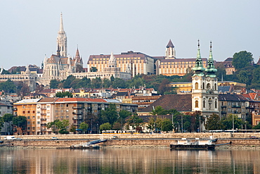 Matthias Church in the Castle District with St. Anne's church visible on the right, Budapest, Hungary, Europe