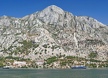 View of the mountains and houses on the edge of Kotor Bay, UNESCO World Heritage Site, Montenegro, Europe