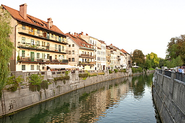 Old buildings on the banks of the Ljubljanica River in Ljubljana, Slovenia, Europe