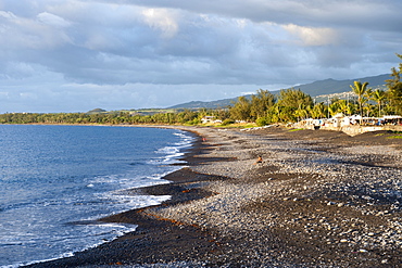 The volcanic coastline and the market at the village of St. Paul on the French island of Reunion in the Indian Ocean, Africa