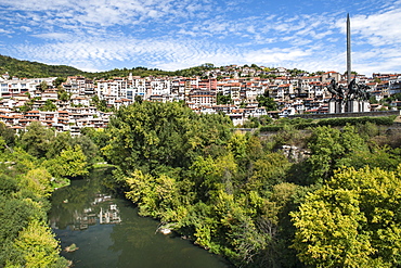 View of the Yantra River and houses of the city of Veliko Tarnovo in Bulgaria, Europe