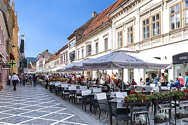 Republic Street in the old town in Brasov, a city in the central Transylvania region of Romania, Europe