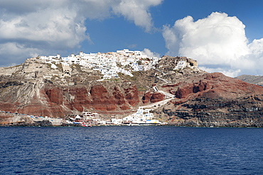 View of the village and port of Oia on the Greek island of Santorini, Cyclades, Greek Islands, Greece, Europe