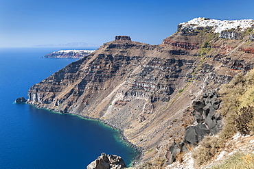 Imerovigli village on the right, and Oia village in the distance on the Greek island of Santorini, Cyclades, Greek Islands, Greece, Europe