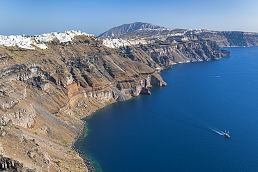 View of the coastline and houses of Fira and Firstefani on the Greek island of Santorini, Cyclades, Greek Islands, Greece, Europe