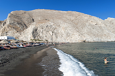 Perissa beach and Messavouno mountain on the Greek island of Santorini, Cyclades, Greek Islands, Greece, Europe