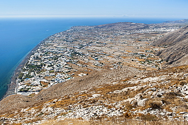 View from Messavouno mountain onto the beach and village of Perissa and the area of Perivolos on the Greek island of Santorini, Cyclades, Greek Islands, Greece, Europe