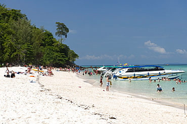 Tourists on Bamboo island (Ko Mai Phai) near Koh Phi Phi in the Andaman Sea on Thailand's west coast.