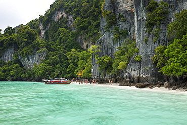 Tourist boats and the coast of Koh Phi Phi island in Thailand.