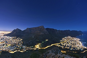 Table Mountain and Cape Town in moonlight.