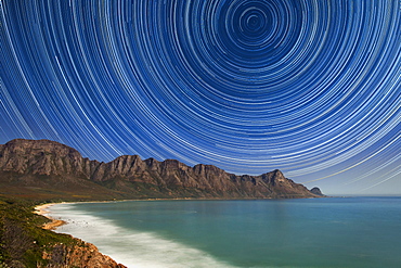 Star trails over Kogel Bay near Cape Town, South Africa.