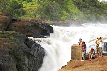 Group of tourists at Murchison Falls on the Victoria Nile River in the Murchison Falls National Park in Uganda.