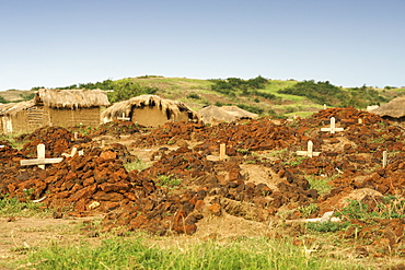 Cemetery and crosses in a village in Kabwoya wildlife reserve on the shores of Lake Albert in Uganda.