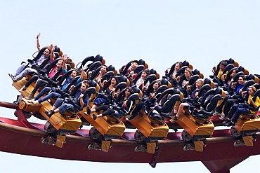 People riding a roller-coaster, Tivoli Gardens Amusement Park, Copenhagen, Denmark, Scandinavia, Europe