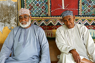 Omani men sitting in the Mutrah souk in Muscat, the capital of the sultanate of Oman.