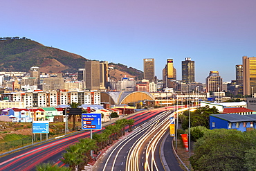 Early morning view of traffic trails on Eastern Boulevard leading into the city of Cape Town, South Africa.