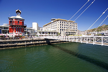 The pedestrian bridge at the old clock tower in the waterfront in Cape Town South Africa.