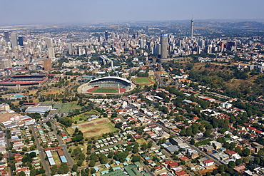 Aerial view of downtown Johannesburg and its eastern suburbs in South Africa. This view clearly shows the Johannesburg stadium and Ellis Park rugby and soccer grounds where some of the 2010 world cup soccer matches will be held.