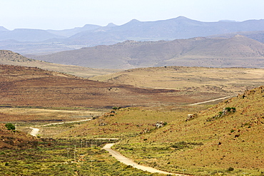 The gravel road in the Karoo leading to the town of Nieu Bethesda in South Africa.