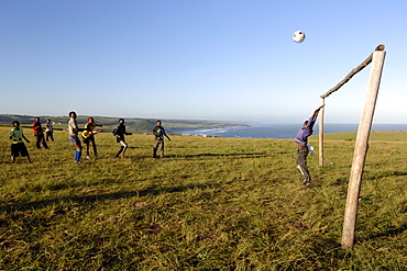 Young Xhosa boys playing football on the hills near Mazeppa Bay in the Eastern Cape Province of South Africa.