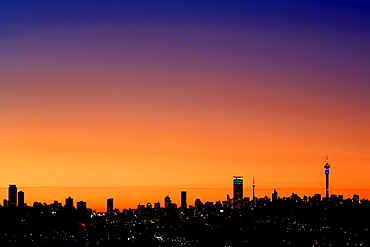 The Johannesburg skyline at dusk.