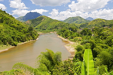 View of the Lokoho River, Manantenina village and the tropical landscape along the Sambava-Andapa road near Marojejy National Park, Antsiranana province of northeast Madagascar, Madagascar, Africa