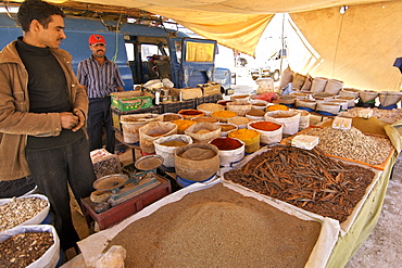 Spices for sale in a stall at an open air market near Ouarzazate in Morocco