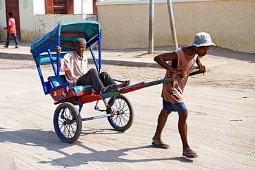 Rickshaw on the streets of Morondava in southwestern Madagascar, Madagascar, Africa