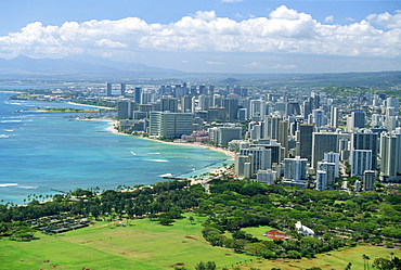 View over coast north west from lookout on crater rim of Diamond Head, over Kapiolani Park and city of Waikiki, Oahu, Hawaii, United States of America, Pacific, North America